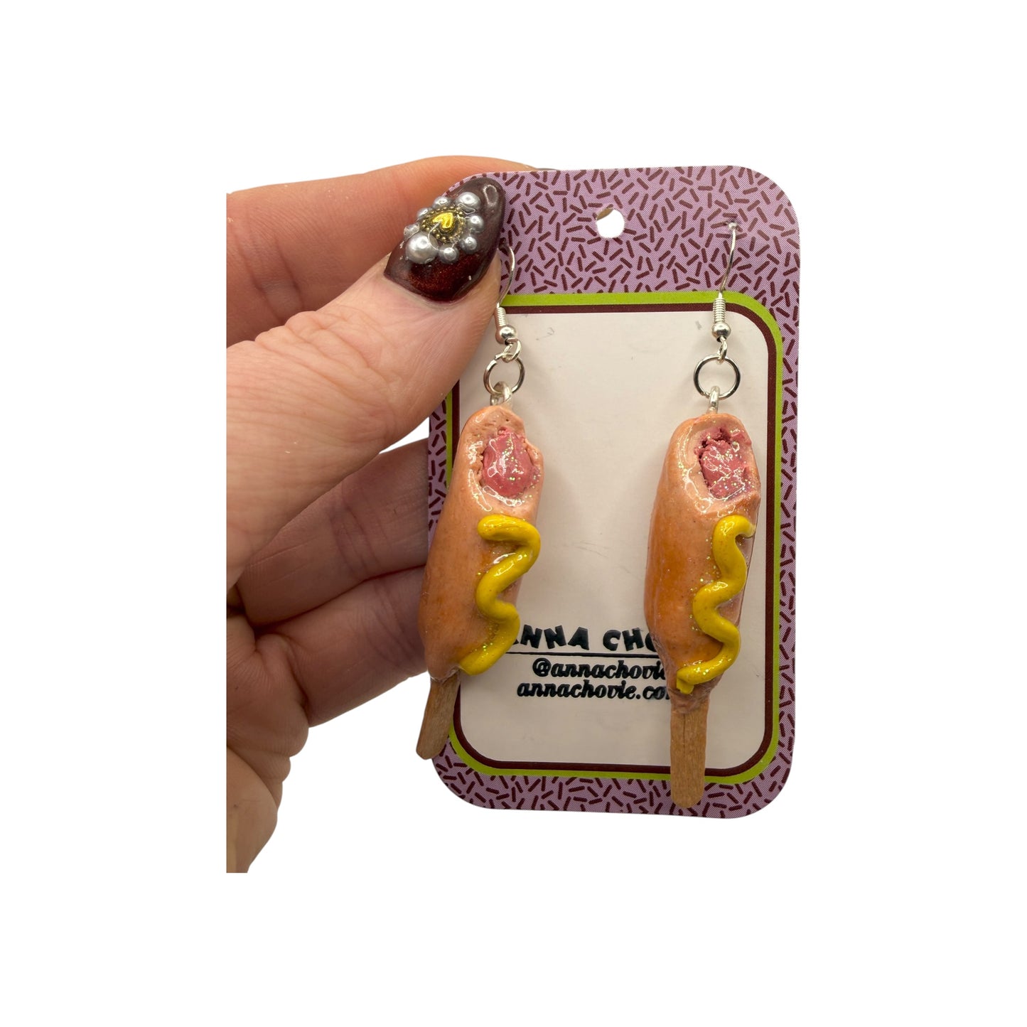 Earrings by Anna Chovie