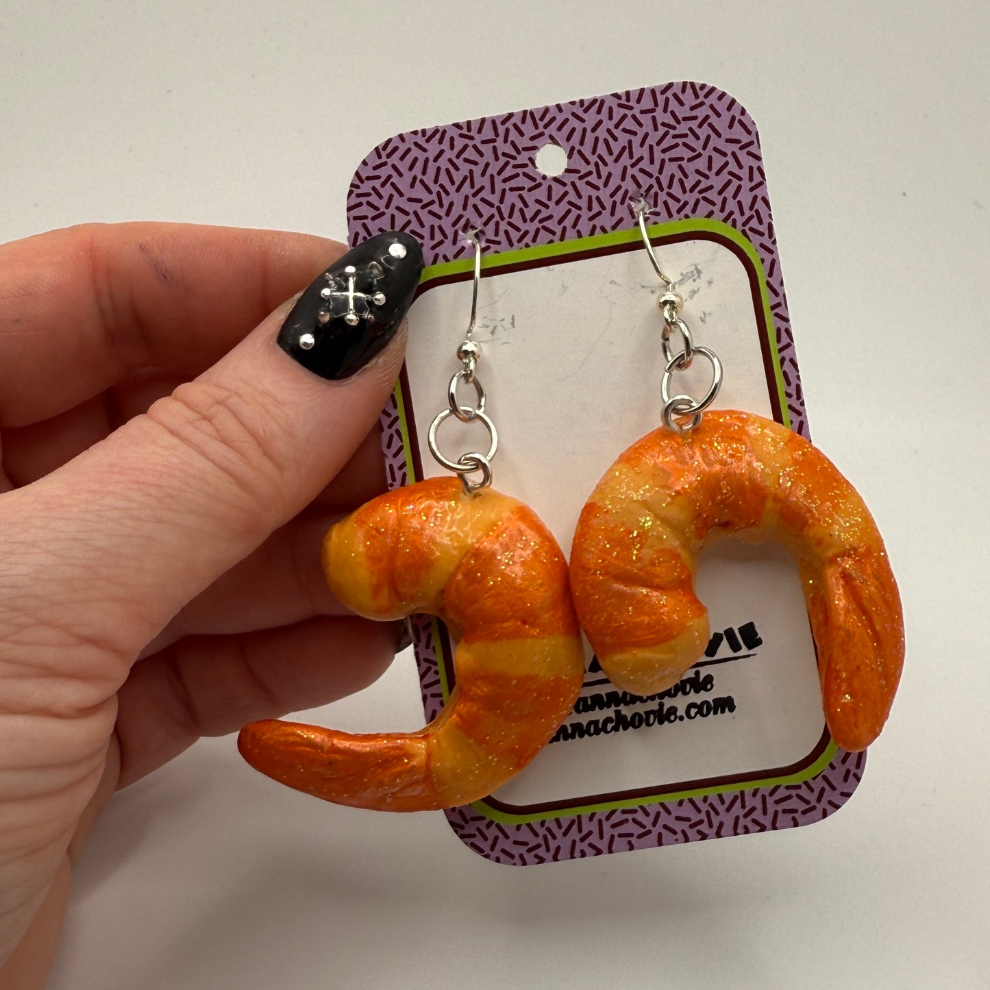 Earrings by Anna Chovie