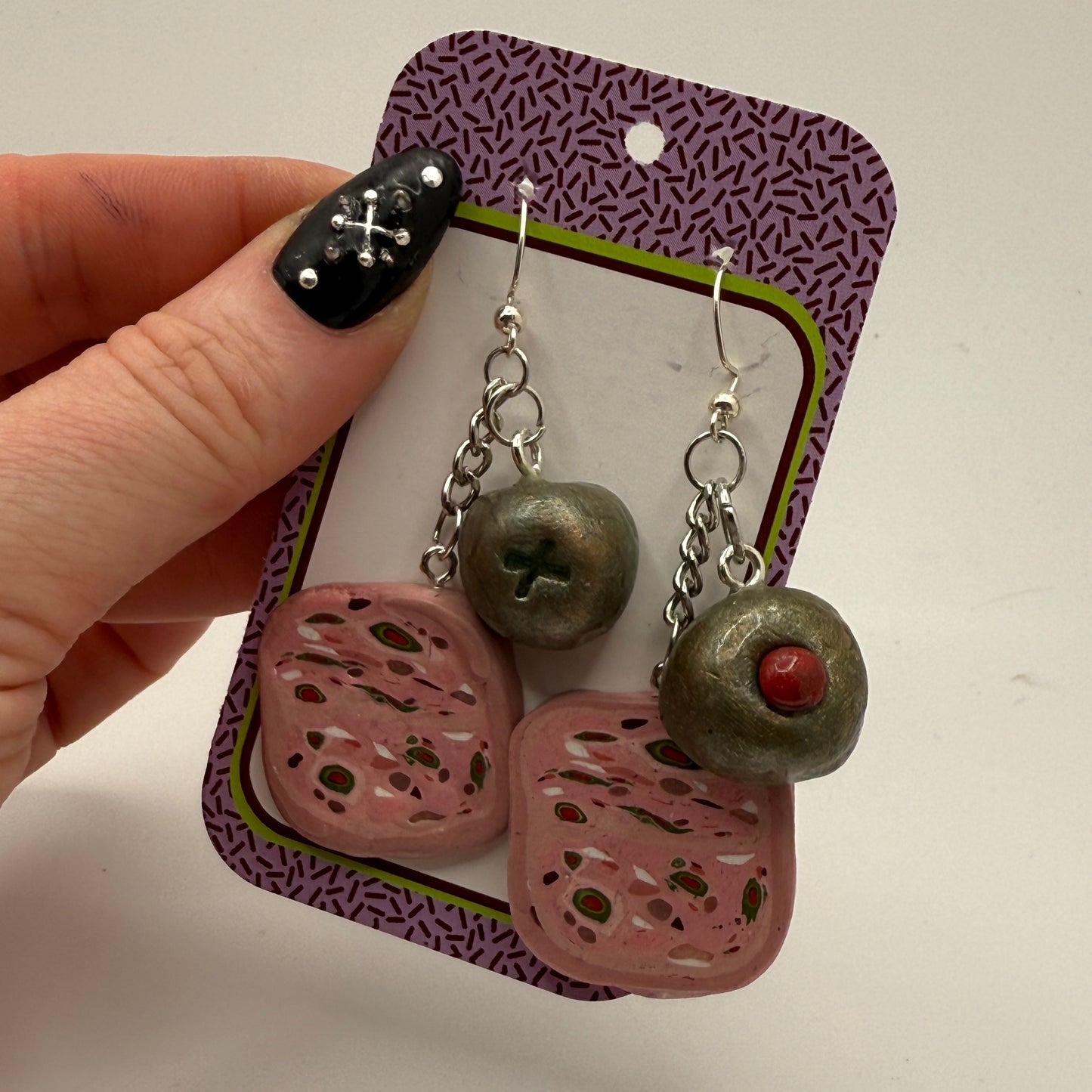 Earrings by Anna Chovie