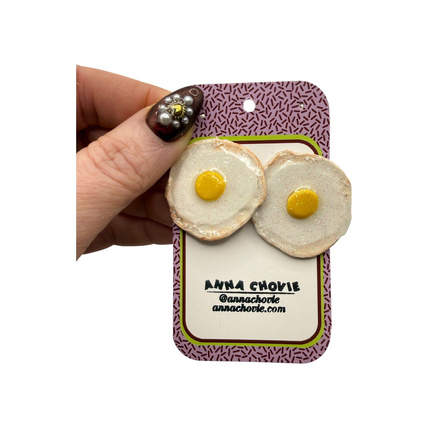 Earrings by Anna Chovie