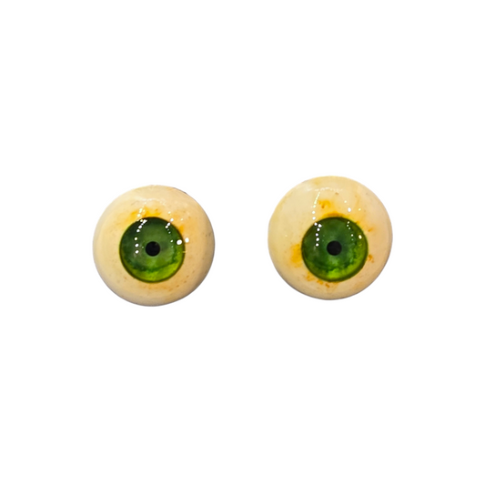 Stud Earrings by Zombie Head